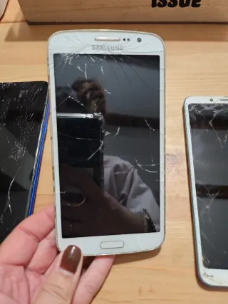 Móviles rotos para piezas