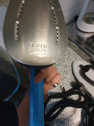 Centro planchado vertical Rowenta + cepillo