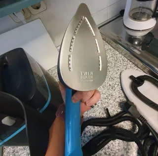 Centro planchado vertical Rowenta + cepillo