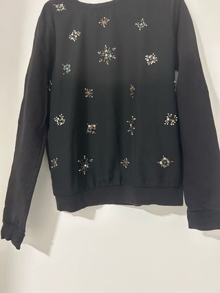 Jersey negro con pedrería talla M