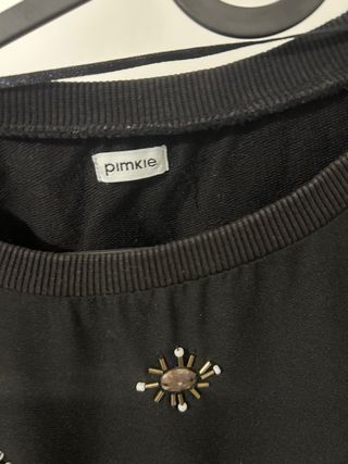 Jersey negro con pedrería talla M