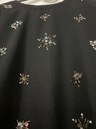 Jersey negro con pedrería talla M