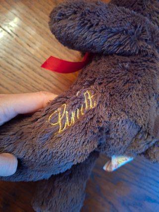 peluche orsetto marrone Lindt fiocco rosso