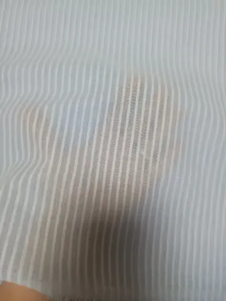 Trozo de tela a rayas azul y blanco