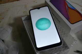 Telemóvel completo na caixa com capa