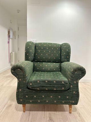 Sillón de tela verde