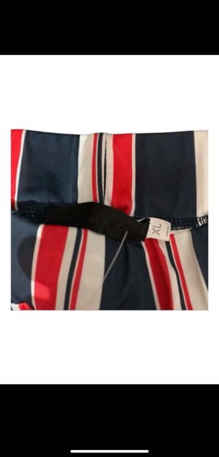 Calça pantalona listrada mulher