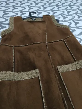 Abrigo sin mangas piel vuelta