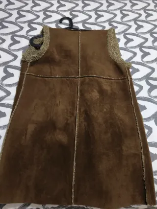 Abrigo sin mangas piel vuelta