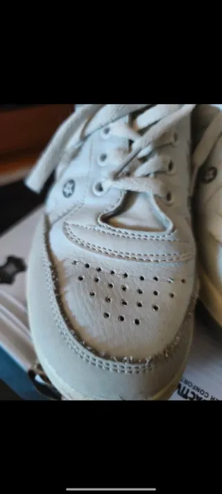 Zapatillas tenis mojado