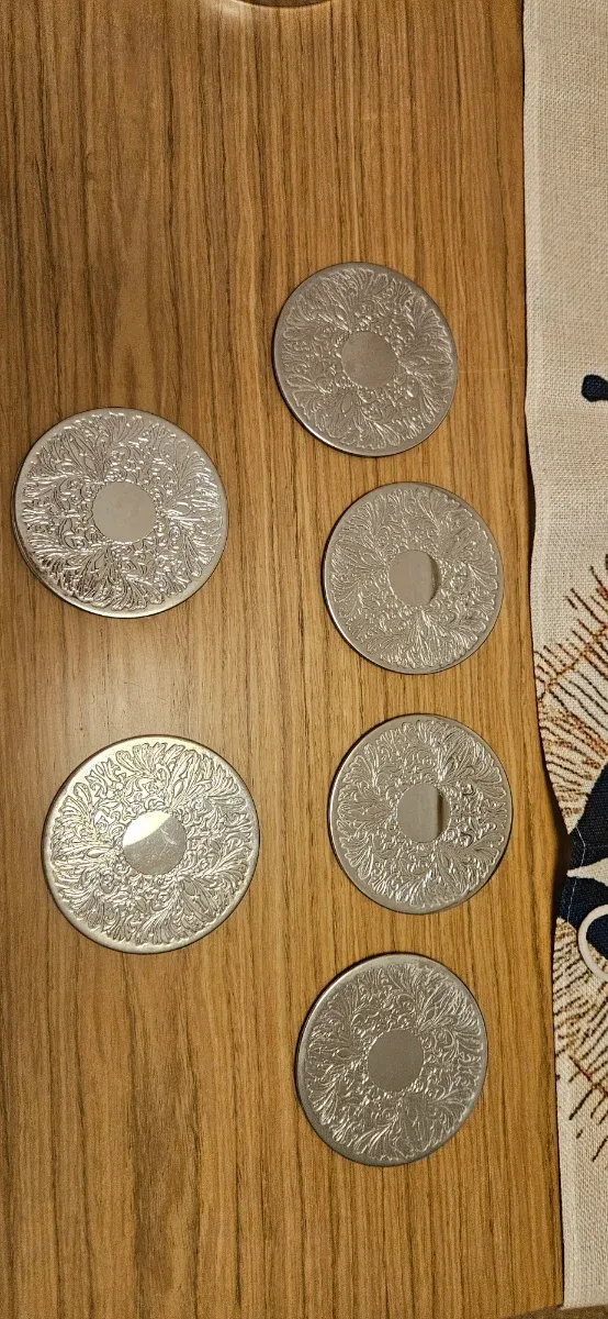 Juego de 6 posavasos plateados