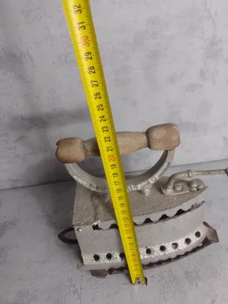 Plancha antigua de hierro fundido