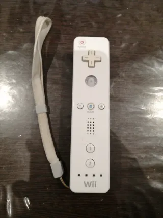 Consola Nintendo Wii Blanca + mando + Juego.