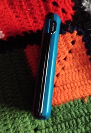 Teléfono Móvil Nokia 7100 con Funda