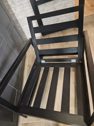 Butaca mecedora de hierro, tapizada negro