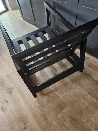 Butaca mecedora de hierro, tapizada negro