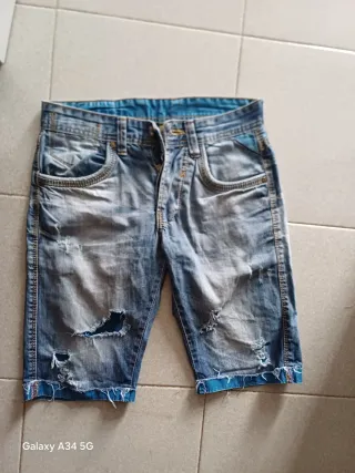 Jeans uomo strappati taglia S