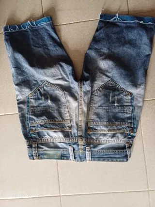 Jeans uomo strappati taglia S