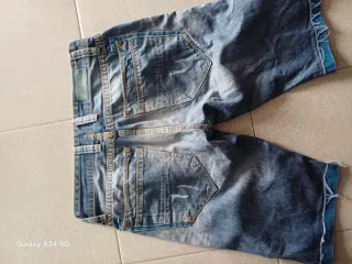 Jeans uomo strappati taglia S