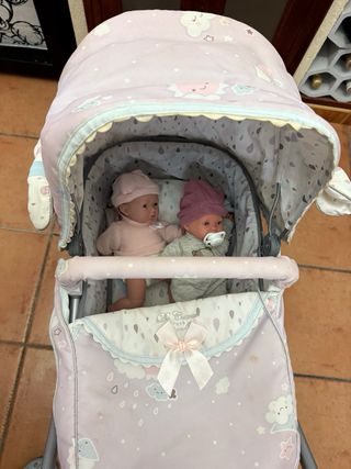 Cochecito de muñecas rosa
