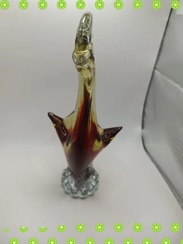 Cigno in vetro rosso e giallo