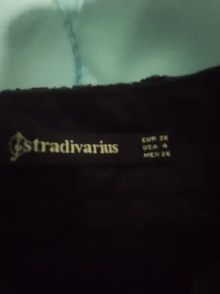 Falda polipiel plisada negra