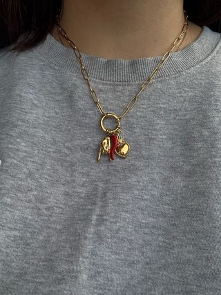 Collana scaramantica acciaio inox oro e rosso