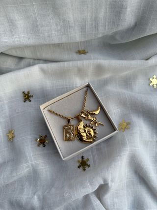 Collana con ciondoli sole e luna acciaio