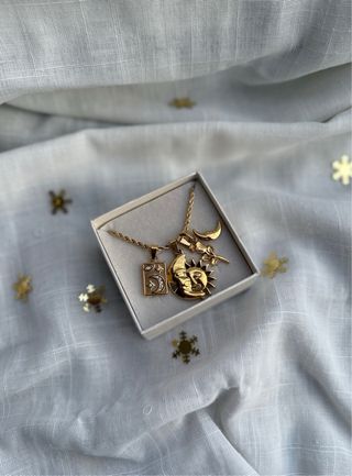 Collana con ciondoli sole e luna acciaio