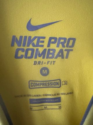 Camiseta Nike Pro Combat Amarilla Técnica