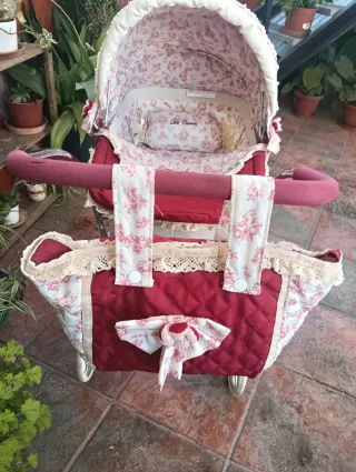 Carrito de bebé de juguete De Cuevas