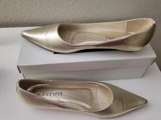 Zapatos planos dorados