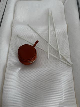 Mochila cambiador gris con detalles marrones