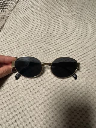 Gafas de sol ovaladas doradas