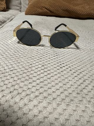 Gafas de sol ovaladas doradas