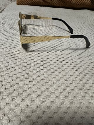 Gafas de sol ovaladas doradas