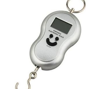 Báscula portátil para pesar maletas