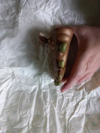 Thun bimba su altalena e cucciolo del presepe