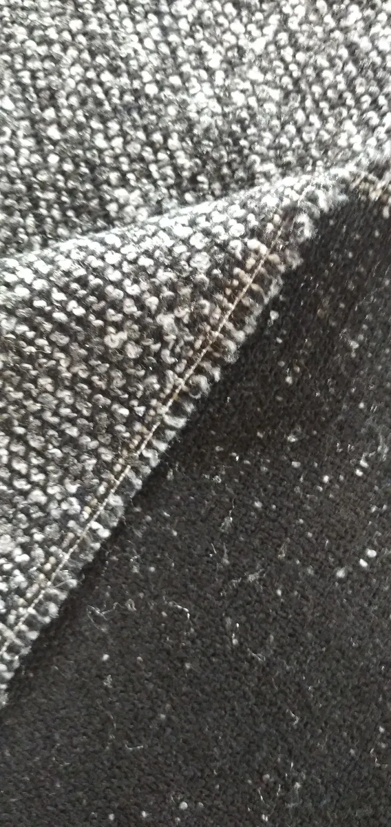 Retal de confección.Tejido tweed gris y negro.