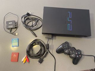 PlayStation 2 Fat Negra + 8 Juegos + 2 Memory Card