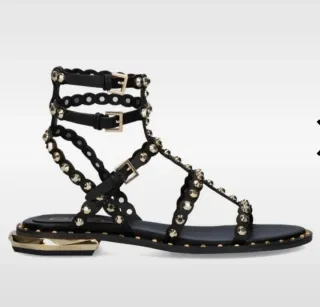 Sandalias gladiador EXE negras con detalles dorado