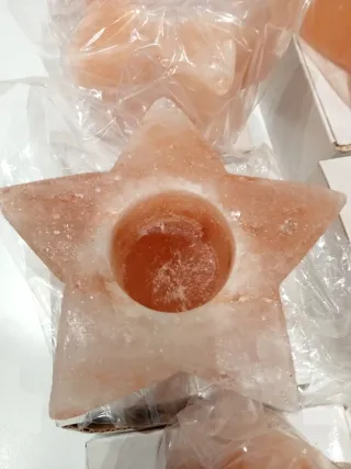 Portacandele in sale dell'Himalaya a forma di stella