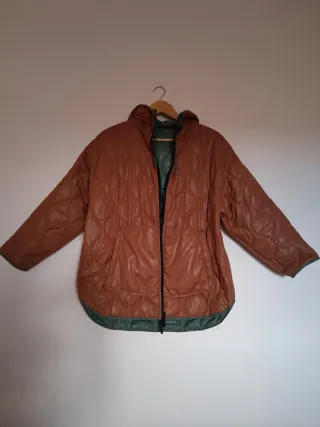 Plumas reversible Born Living Yoga.