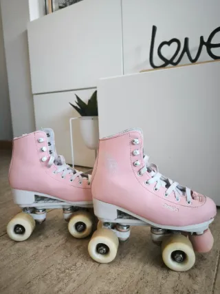 Patines Oxelo rosas 4 ruedas. Talla 35