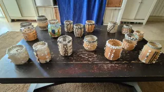 Portacandele in cristallo decorati con sabbia e pietra