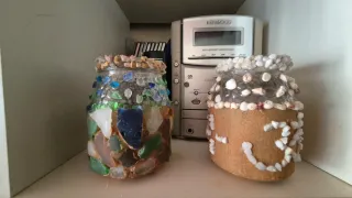 Portacandele in cristallo decorati con sabbia e pietra