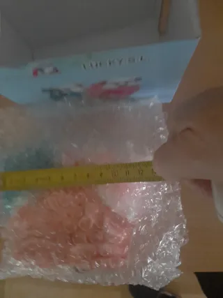 Hucha cerdito con plumas