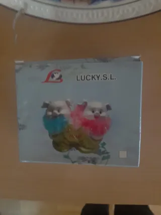 Hucha cerdito con plumas