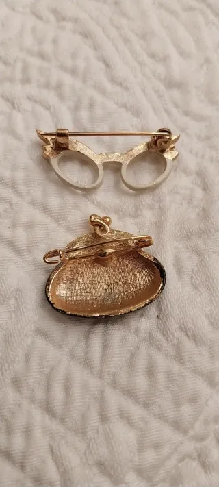 Broches vintage negros y dorados