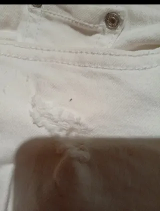 Vaqueros blancos cortos